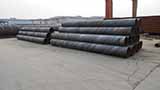 What materials are used for anti-corrosion treatment of spiral steel pipes