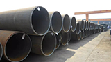 Derusting method and production process of large-diameter straight seam steel pipe