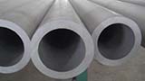 How should thick-walled steel pipes be stacked